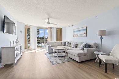 Step into the open-plan living space where light floods in on Barefoot Resort and Golf Club  in South Carolina - for sale on GolfHomes.com, golf home, golf lot