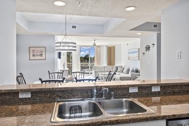 Step into the open-plan living space where light floods in on Barefoot Resort and Golf Club  in South Carolina - for sale on GolfHomes.com, golf home, golf lot