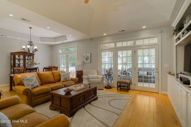 Tucked away on a quiet cul-de-sac in the prestigious gated golf on Brunswick Plantation and Golf Resorts in North Carolina - for sale on GolfHomes.com, golf home, golf lot