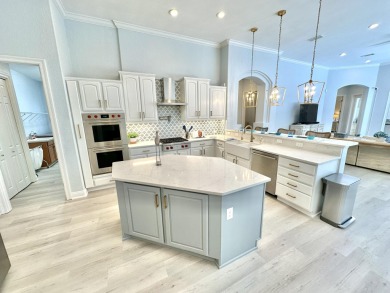 Located on a private end lot and shielded by greenery, this on Sandestin Golf and Beach Resort - Raven in Florida - for sale on GolfHomes.com, golf home, golf lot