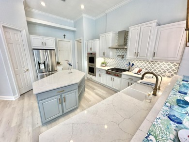 Located on a private end lot and shielded by greenery, this on Sandestin Golf and Beach Resort - Raven in Florida - for sale on GolfHomes.com, golf home, golf lot