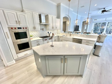 Located on a private end lot and shielded by greenery, this on Sandestin Golf and Beach Resort - Raven in Florida - for sale on GolfHomes.com, golf home, golf lot