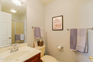 Tucked away on a quiet cul-de-sac in the prestigious gated golf on Brunswick Plantation and Golf Resorts in North Carolina - for sale on GolfHomes.com, golf home, golf lot