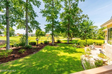 Tucked away on a quiet cul-de-sac in the prestigious gated golf on Brunswick Plantation and Golf Resorts in North Carolina - for sale on GolfHomes.com, golf home, golf lot