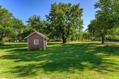 Welcome home to this fantastic well-built home nestled in the on Peabody Golf Course in Kansas - for sale on GolfHomes.com, golf home, golf lot