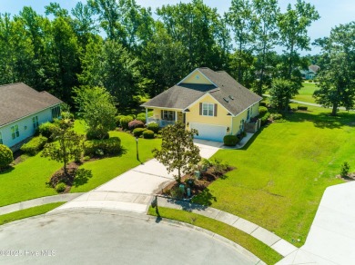 Tucked away on a quiet cul-de-sac in the prestigious gated golf on Brunswick Plantation and Golf Resorts in North Carolina - for sale on GolfHomes.com, golf home, golf lot