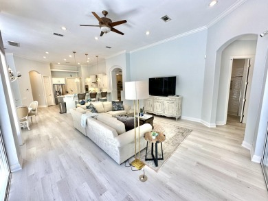 Located on a private end lot and shielded by greenery, this on Sandestin Golf and Beach Resort - Raven in Florida - for sale on GolfHomes.com, golf home, golf lot