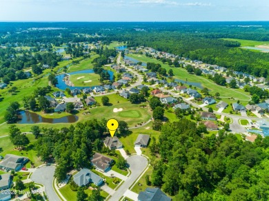 Tucked away on a quiet cul-de-sac in the prestigious gated golf on Brunswick Plantation and Golf Resorts in North Carolina - for sale on GolfHomes.com, golf home, golf lot