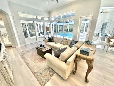 Located on a private end lot and shielded by greenery, this on Sandestin Golf and Beach Resort - Raven in Florida - for sale on GolfHomes.com, golf home, golf lot