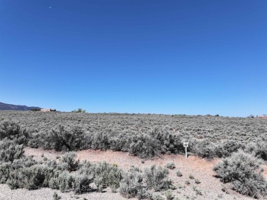 You have just found an amazing lot within the Taos Country Club on Taos Country Club in New Mexico - for sale on GolfHomes.com, golf home, golf lot