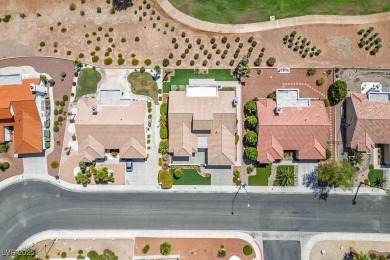 This exquisite home is perfect for those who adore both indoor & on Highland Falls Golf Club in Nevada - for sale on GolfHomes.com, golf home, golf lot