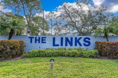 Nestled in this charming community, the Links, this lovely on Seminole Lake Country Club in Florida - for sale on GolfHomes.com, golf home, golf lot