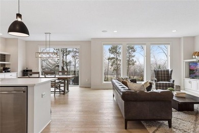 Experience modern luxury in this stunning custom-built Gonyea on Rush Creek Golf Club in Minnesota - for sale on GolfHomes.com, golf home, golf lot