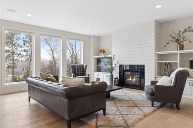 Experience modern luxury in this stunning custom-built Gonyea on Rush Creek Golf Club in Minnesota - for sale on GolfHomes.com, golf home, golf lot