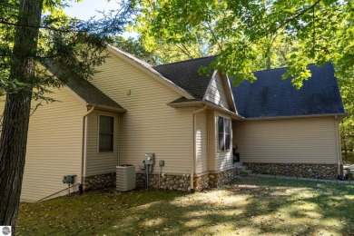 Welcome to your dream home in Canadian Lakes! This home offers on Canadian Lakes Country Club-The Highlands Course in Michigan - for sale on GolfHomes.com, golf home, golf lot