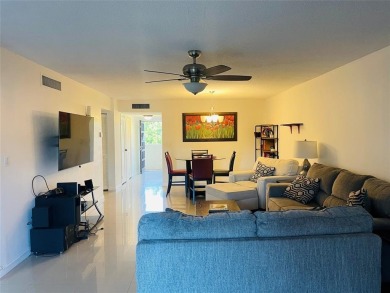Spacious 2-bedroom, 2-bath condo in a gated community. Both on  in Florida - for sale on GolfHomes.com, golf home, golf lot