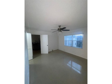 Spacious 2-bedroom, 2-bath condo in a gated community. Both on  in Florida - for sale on GolfHomes.com, golf home, golf lot