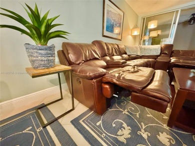 Welcome home to this warm and inviting, FULLY FURNISHED TURNKEY on Palm-Aire Country Club and Resort - Palms in Florida - for sale on GolfHomes.com, golf home, golf lot