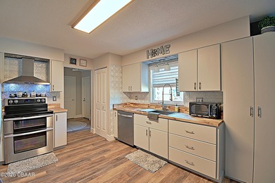 CLEAN and BETTER than turn-key! Welcome home to this beautifully on Daytona Beach Golf Club in Florida - for sale on GolfHomes.com, golf home, golf lot