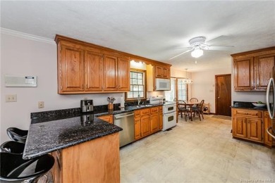 Colonial style home offering 3 bedrooms, 3 bathrooms, and 2,367 on The Brookwoods Golf Club in Virginia - for sale on GolfHomes.com, golf home, golf lot