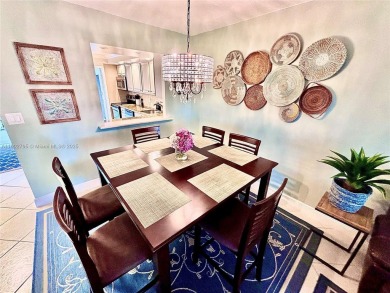 Welcome home to this warm and inviting, FULLY FURNISHED TURNKEY on Palm-Aire Country Club and Resort - Palms in Florida - for sale on GolfHomes.com, golf home, golf lot