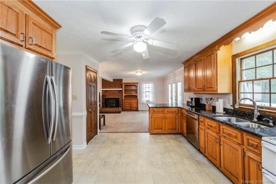 Colonial style home offering 3 bedrooms, 3 bathrooms, and 2,367 on The Brookwoods Golf Club in Virginia - for sale on GolfHomes.com, golf home, golf lot