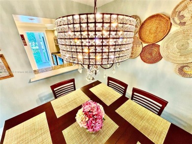 Welcome home to this warm and inviting, FULLY FURNISHED TURNKEY on Palm-Aire Country Club and Resort - Palms in Florida - for sale on GolfHomes.com, golf home, golf lot