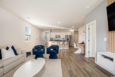 Welcome to this stunning 5-bedroom, 3.5-bath home in the Island on Island Green Golf Club in South Carolina - for sale on GolfHomes.com, golf home, golf lot