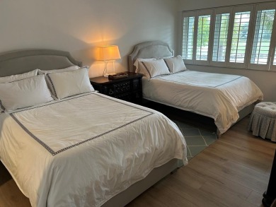 PRICED TO SELL! Unique top floor 2 bedroom 2 bath Fairway Lakes on Ocean Reef Club in Florida - for sale on GolfHomes.com, golf home, golf lot