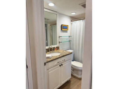 PRICED TO SELL! Unique top floor 2 bedroom 2 bath Fairway Lakes on Ocean Reef Club in Florida - for sale on GolfHomes.com, golf home, golf lot