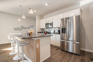 Welcome to this stunning 5-bedroom, 3.5-bath home in the Island on Island Green Golf Club in South Carolina - for sale on GolfHomes.com, golf home, golf lot