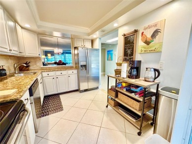 Welcome home to this warm and inviting, FULLY FURNISHED TURNKEY on Palm-Aire Country Club and Resort - Palms in Florida - for sale on GolfHomes.com, golf home, golf lot