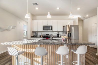 Welcome to this stunning 5-bedroom, 3.5-bath home in the Island on Island Green Golf Club in South Carolina - for sale on GolfHomes.com, golf home, golf lot