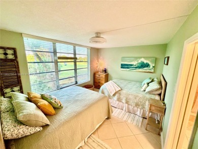 Welcome home to this warm and inviting, FULLY FURNISHED TURNKEY on Palm-Aire Country Club and Resort - Palms in Florida - for sale on GolfHomes.com, golf home, golf lot