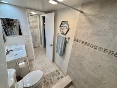 Welcome home to this warm and inviting, FULLY FURNISHED TURNKEY on Palm-Aire Country Club and Resort - Palms in Florida - for sale on GolfHomes.com, golf home, golf lot
