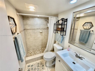 Welcome home to this warm and inviting, FULLY FURNISHED TURNKEY on Palm-Aire Country Club and Resort - Palms in Florida - for sale on GolfHomes.com, golf home, golf lot
