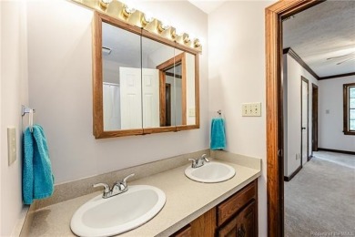 Colonial style home offering 3 bedrooms, 3 bathrooms, and 2,367 on The Brookwoods Golf Club in Virginia - for sale on GolfHomes.com, golf home, golf lot
