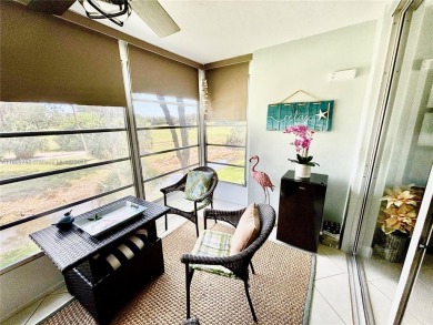 Welcome home to this warm and inviting, FULLY FURNISHED TURNKEY on Palm-Aire Country Club and Resort - Palms in Florida - for sale on GolfHomes.com, golf home, golf lot