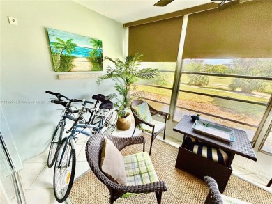 Welcome home to this warm and inviting, FULLY FURNISHED TURNKEY on Palm-Aire Country Club and Resort - Palms in Florida - for sale on GolfHomes.com, golf home, golf lot