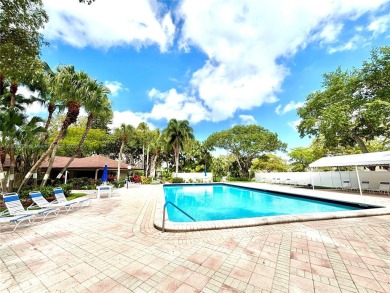 Welcome home to this warm and inviting, FULLY FURNISHED TURNKEY on Palm-Aire Country Club and Resort - Palms in Florida - for sale on GolfHomes.com, golf home, golf lot