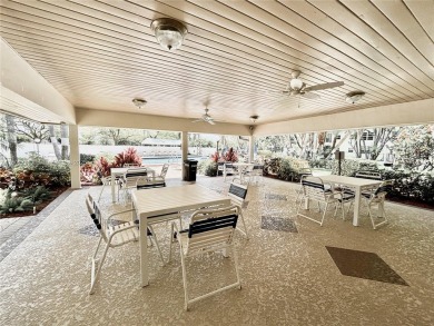 Welcome home to this warm and inviting, FULLY FURNISHED TURNKEY on Palm-Aire Country Club and Resort - Palms in Florida - for sale on GolfHomes.com, golf home, golf lot
