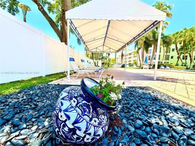 Welcome home to this warm and inviting, FULLY FURNISHED TURNKEY on Palm-Aire Country Club and Resort - Palms in Florida - for sale on GolfHomes.com, golf home, golf lot