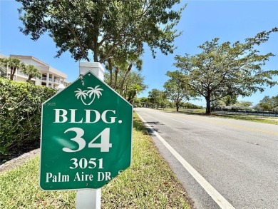 Welcome home to this warm and inviting, FULLY FURNISHED TURNKEY on Palm-Aire Country Club and Resort - Palms in Florida - for sale on GolfHomes.com, golf home, golf lot