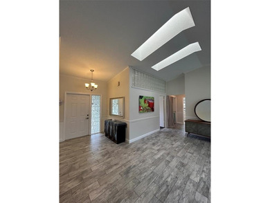 Discover this stunning, fully renovated home in Boca Raton on Boca Lago Golf and Country Club in Florida - for sale on GolfHomes.com, golf home, golf lot