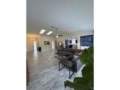 Discover this stunning, fully renovated home in Boca Raton on Boca Lago Golf and Country Club in Florida - for sale on GolfHomes.com, golf home, golf lot