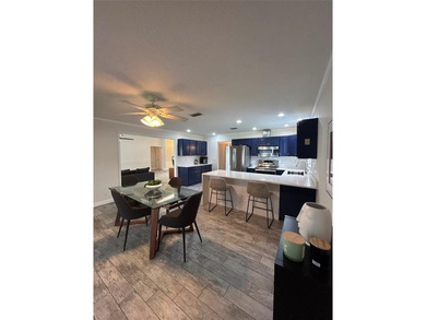 Discover this stunning, fully renovated home in Boca Raton on Boca Lago Golf and Country Club in Florida - for sale on GolfHomes.com, golf home, golf lot