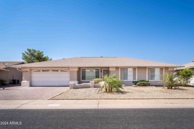 Discover this beautifully remodeled Sun City home in a thriving on Sun City Lakes West and East in Arizona - for sale on GolfHomes.com, golf home, golf lot