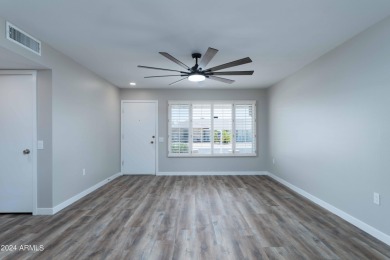 Discover this beautifully remodeled Sun City home in a thriving on Sun City Lakes West and East in Arizona - for sale on GolfHomes.com, golf home, golf lot