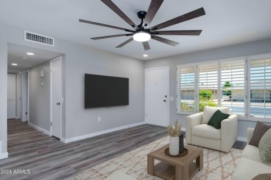 Discover this beautifully remodeled Sun City home in a thriving on Sun City Lakes West and East in Arizona - for sale on GolfHomes.com, golf home, golf lot