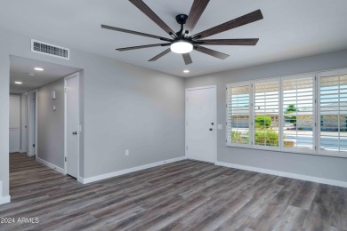 Discover this beautifully remodeled Sun City home in a thriving on Sun City Lakes West and East in Arizona - for sale on GolfHomes.com, golf home, golf lot